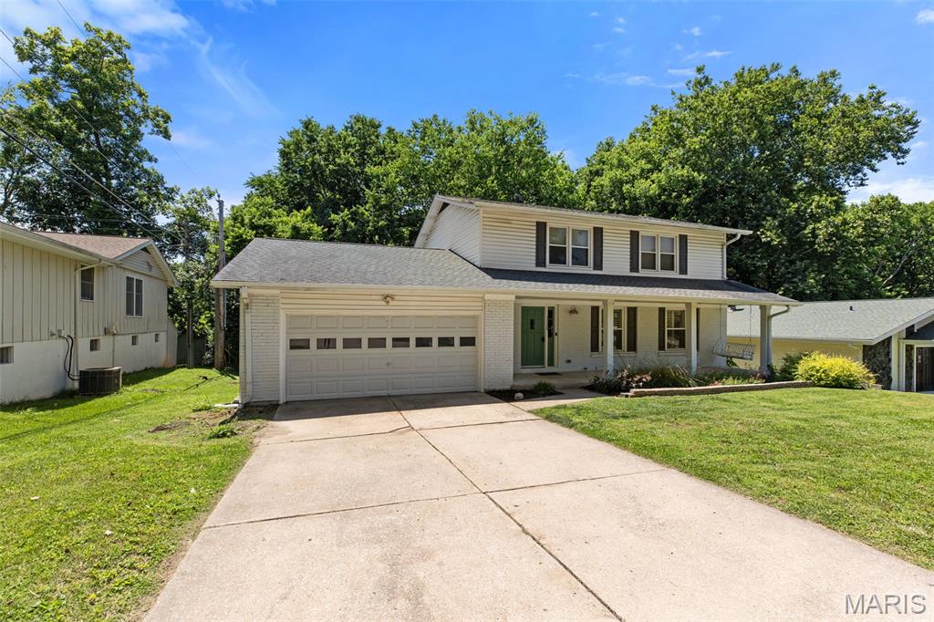 Beautifully updated 2-story home offering over 3,000 sq ft of living space in a desirable St. Charles location. This open, light-filled floor plan features fresh paint, rich hardwood flooring, and updated 6-panel doors throughout. The kitchen shines with brand-new stainless-steel appliances and flows seamlessly into spacious living and dining areas—perfect for everyday living and entertaining. Upstairs offers 4 generously sized bedrooms, including a primary suite. The finished lower level provides additional living space with a large rec/family room. Enjoy outdoor living on the deck overlooking a private backyard that backs to trees. 2-car attached garage. Move-in ready!  Professional pictures coming soon!  This property will be available to view beginning on June 12, 2026.  Agent-Owner.