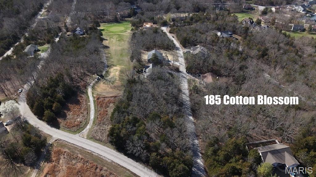 Builders Package with Utilities: Right down from the Big Lake, Golf Course, & New Construction! Buy as an individual lot for lake access or check out the neighboring lots to purchase as a package and save, save, save! These ready-to-build home sites and buildable lots with utilities on site and on golf course are located in this private, gated, resort-style community with breathtaking views four lakes, a white, sandy beach area, golf course, campgrounds, swimming pool, fitness center and more. Perfect for builders planning to build several homes at once or to anyone seeking a peaceful, recreational lifestyle away from St. Louis, but still very close for easy family visits. Also perfect for get-away lake home. Enjoy the golf course, lake, boating, fishing, clubhouse, pool, etc. ! Just 20 minutes from The Heart of Saint Louis! 
Builders Package:

Developers Paradise: 
Can be combined with:
112 CottonBlossom (Sub Golf Course Lot)
165 CottonBlossom (Golf Course Lot)
166 Cotton Blossom (Sub Golf Course Lot) 
185 CottonBlossom (Golf Course Lot)
9633 Magnolia (Golf Course Lot)  
5724 Treebrook (Golf Course Lot) 
5728 Treebrook (Golf Course Lot)
5736 Treebrook (Golf Course Lot) 
5740 Treebrook (Golf Course Lot) 

& More!