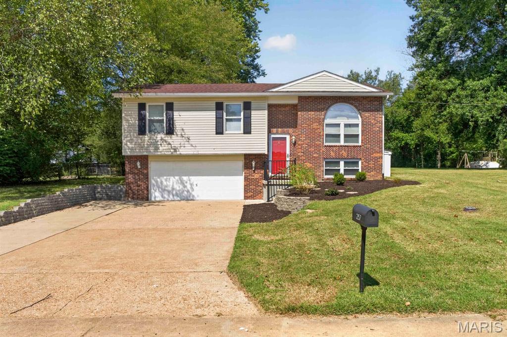 Welcome to 2157 Gregory Drive, a beautifully updated and meticulously maintained 3-bedroom, 2-bath home that is truly ready for its next chapter. From the moment you step inside, the fresh paint and new flooring create a bright, welcoming feel, while thoughtful updates including a newer roof, newer HVAC system, and brand-new garage door opener offer peace of mind. At the heart of the home, the spacious kitchen opens naturally to the living room and continues outside to the back patio, making everyday living and entertaining feel effortless. Step outside and you'll find a large, level yard with a scenic 1-acre stocked pond, creating a peaceful backdrop for morning coffee, summer gatherings, or simply enjoying a little extra space to spread out. Downstairs, the fully equipped lower level gives you even more room to relax and entertain, whether it's movie nights, game days, or a space for everyone to gather. And yes, the seller is even leaving the projector, so your first movie night is ready to go! Exceptionally clean, well-cared for, and move-in ready, this is a home that makes it easy to settle in and start enjoying it from day one. Conveniently located just minutes from town, this home offers plenty of space both inside and out, with a 2-car garage and additional parking pad providing ample room for vehicles, guests, or extra storage, while keeping everyday errands and amenities close by. Come see why 2157 Gregory Drive might be the perfect place to start your next chapter.
