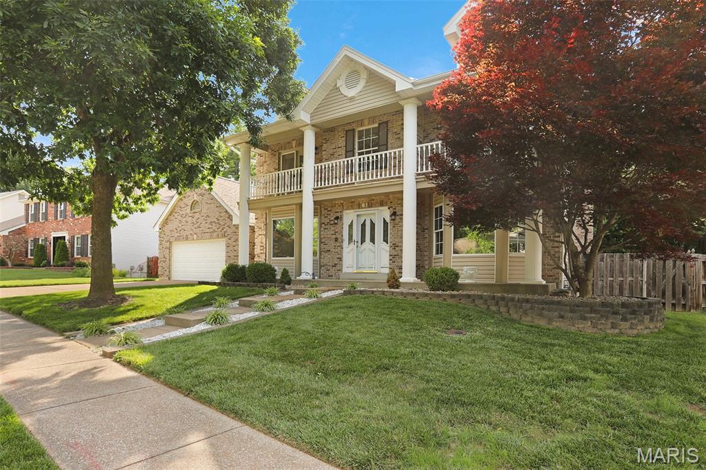Classic Colonial Charm Meets Modern Updates in Riverwood Estates. Welcome home to this beautiful two-story featuring iconic columns, a covered front porch, and a second-story balcony that creates unforgettable curb appeal. Inside, you'll find fresh updates throughout, including luxury vinyl plank flooring, interior paint, an updated kitchen with solid surface countertops, and a cozy gas fireplace. The spacious floor plan offers four bedrooms, a generous primary suite with two walk-in closets, and a private bath featuring a garden tub and separate shower. The finished lower level adds valuable flexible space with a recreation room, bonus rooms, and a full bath. Outside, enjoy the fenced backyard, deck, and patio—perfect for entertaining or relaxing. This home offers the space, character, and updates today's buyers are looking for.