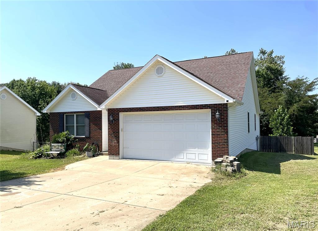 Excellent location east of Union, close to I-44 for easy commute.  Large, fenced yard perfect for pets and children.  Updated kitchen and floors within the last 3 years.  3 bedrooms and 2 full baths on main floor, along with laundry.  Covered deck with dual access from family room and primary bedroom suite and steps to yard area.  Lower level nearly completely finished with large family room area, dry bar and dart board, and even more space for office, day room/fourth bedroom, and 3rd full bath.  Walkout to covered patio.