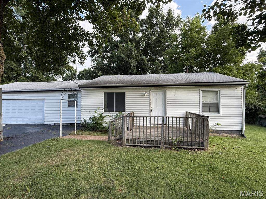 Bring your vision and unlock the potential of this 2-bedroom, 1-bath ranch situated on nearly half an acre in a highly sought-after area! This property offers solid bones and a functional layout, but it is ready for a complete update, making it an excellent opportunity for investors, rehabbers, or buyers looking to build sweat equity. The main level features a good-sized kitchen, full bath, and original hardwood flooring that could potentially be refinished to restore its character. An oversized 2-car garage provides valuable storage, workshop space, or room for vehicles and equipment. With a desirable location, generous lot, and plenty of room to improve and add value, this property is ready for someone to bring it back to life. Property is being sold as-is; seller will make no repairs.
