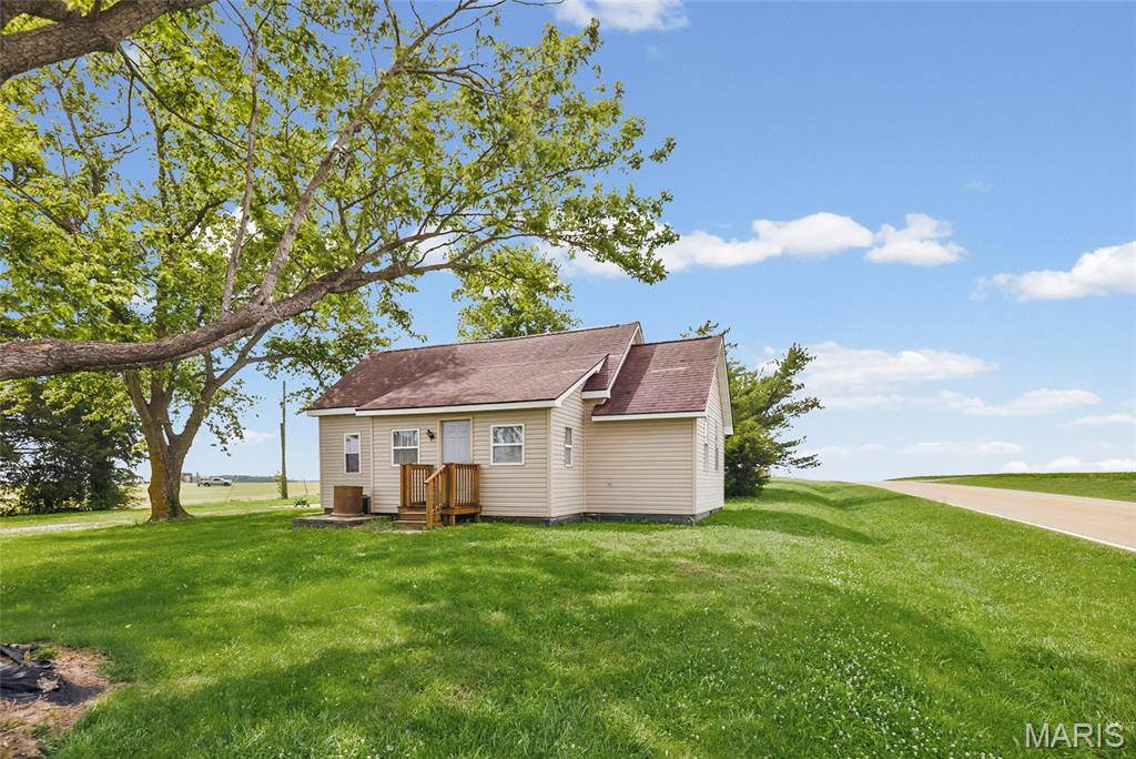 Cozy country home on 1 acre located just minutes from Pyramid State Recreation Area! This 2-bedroom, 1-bathroom property offers the peaceful setting of rural living and would make a great starter home, weekend retreat, or Airbnb opportunity.

Inside, you’ll find hardwood floors, a spacious kitchen with plenty of cabinet space, and main-level laundry for added convenience. The large enclosed porch has previously been used as a bedroom, offering additional flexible living space. The bathroom features updated flooring, and a brand-new HVAC system installed in 2024 adds comfort and efficiency. A partial unfinished basement provides extra storage space or room for a workshop area.

The 1-acre lot offers plenty of space to add on, build a garage or pole barn, or even build a new home in the future. Enjoy beautiful sunset views and a quiet country setting while still being close to outdoor recreation and hunting opportunities.
