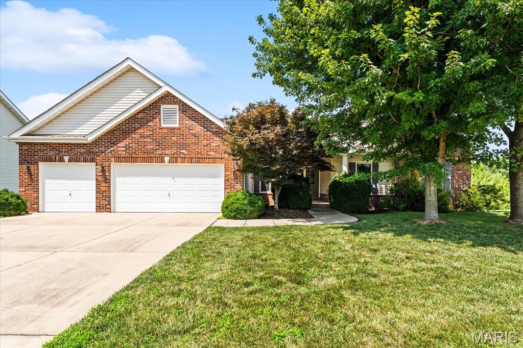 This beautiful ranch home is nestled on a quiet cul-de-sac in Windsor Estate Neighborhood which backs to a private lot, offering the rare advantage of no future rear neighbors.  Step into the welcoming foyer featuring wood flooring that continues into the kitchen. The inviting living room showcases a stunning vaulted ceiling and double-sided brick fireplace with custom built-in shelving, creating a warm and cozy focal point that can also be enjoyed from the kitchen.

The home offers both a formal dining room and a spacious eat-in kitchen with room for a table, counter seating, stainless steel appliances, and two large pantries, providing exceptional storage and functionality.

With four generously sized bedrooms, there's space for everyone. The primary suite features a vaulted ceiling and a private en-suite bathroom complete with double sinks, a soaking tub, and a separate shower.

The finished basement expands the living space with a large recreation room and a full bathroom. There is also the potential to add a fifth bedroom with the existing egress windows, along with a spacious unfinished area that offers abundant storage or room for future expansion.  

Step outside to the low-maintenance composite deck overlooking the secluded backyard—an ideal setting for relaxing, entertaining, or simply enjoying the peaceful setting.  This well-maintained home combines comfort, privacy, and versatile living space in a desirable cul-de-sac location.