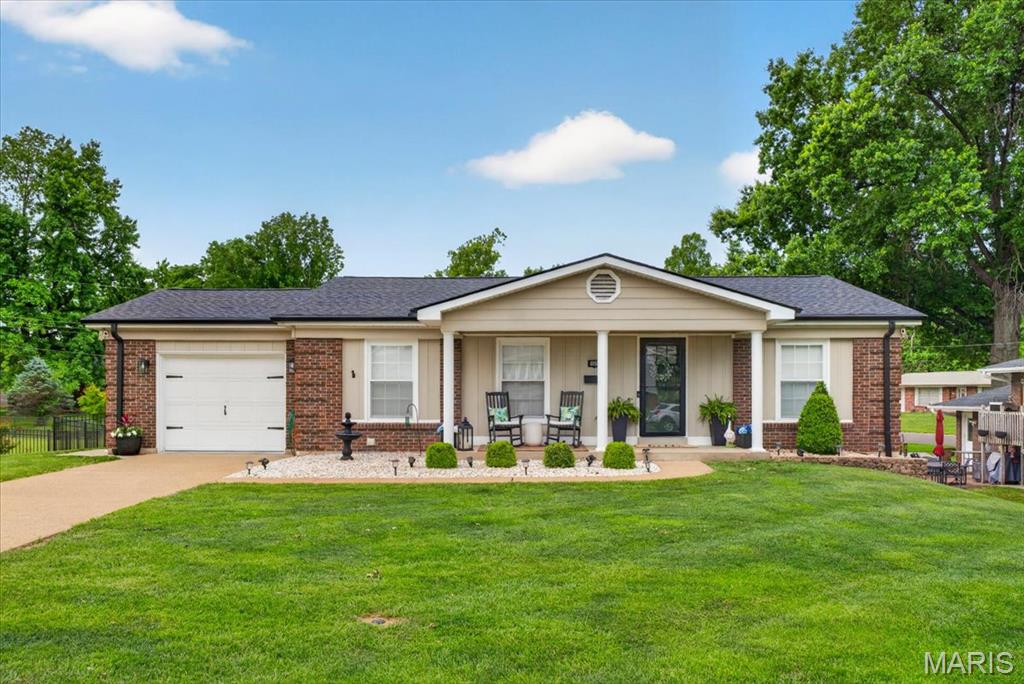 Stunning full-brick 3 bed, 3 bath ranch in the heart of Columbia is ready for you to call HOME! The charming covered front porch offers a warm welcome and is just the beginning of what this beautifully updated property has to offer.
Step inside to discover a completely renovated open-concept main level that perfectly blends modern finishes with timeless character. The inviting living room flows seamlessly into the impressive kitchen featuring custom 42" cabinetry, granite countertops, a huge center island with bar seating, black stainless-steel appliances, and a bright dining area ideal for everyday living and entertaining.
Down the hall, you'll find a spacious primary suite with an updated full bath, two additional bedrooms, and a beautifully updated hall bath. The entire main level showcases new flooring, lighting, three-panel white doors, and 5" white trim. Main-floor laundry adds even more convenience.
The finished walk-out lower level offers incredible flexibility and is the perfect place to entertain or unwind. Enjoy a cozy family room with an electric fireplace, a full wet bar, recreation area, game room, full bath, and plenty of storage space. A second laundry hookup is also available.
French doors lead outside to a peaceful, park-like backyard featuring mature trees, a beautiful fenced yard, an above-ground pool, an oversized concrete patio perfect for grilling and gatherings, a storage shed, and a playset.
Located just minutes from Columbia's Historic Main Street District, you'll enjoy easy access to shopping, dining, and local charm. With generous living spaces inside and out, this picture-perfect home is ready to help you Live Where You Love!