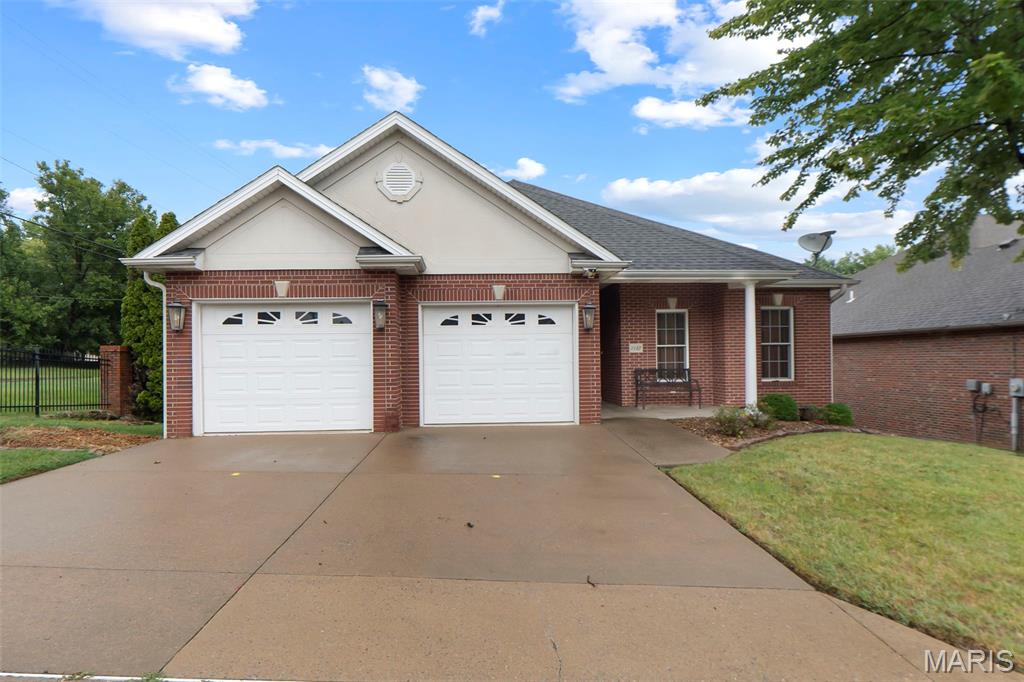 Welcome to 1132 N Cape Rock Dr.  This classic ranch all brick home was built in 2005.  This home is one of 6 homes located in the Villas of Cape Rock Community where you can enjoy maintenance free living...no more lawn care or outside maintenance for the summer or winter months, because that is all taken care of by the HOA.  You will be located in the heart of the area with quick access to Parks, Restaurants and Shopping! There is a 2-car attached garage, the kitchen has stainless steel appliances and ample room for any type of cooking, also includes a convenient peninsula providing functionality for any gathering.  The dining and living room are just off the kitchen area and offer a warm ambiance with inviting hardwood flooring. Other amenities on the main floor are the primary suite with a bath featuring both a jetted bathtub for ultimate relaxation and a walk-in shower and a walk-in closet. There is also another bedroom located on the main floor that can be used for guests or used as a study, if needed.  A dedicated laundry area also located on the main floor has double doors to keep clutter and laundry at bay!   Additional features include a walk-out basement, another bedroom and bathroom, large storage area. Outdoor living is equally inviting with a private patio, a covered patio for shaded enjoyment, and a welcoming porch, each offering distinct spaces for any need. This property is ready for you to come in and relax and enjoy the next chapter of your life!