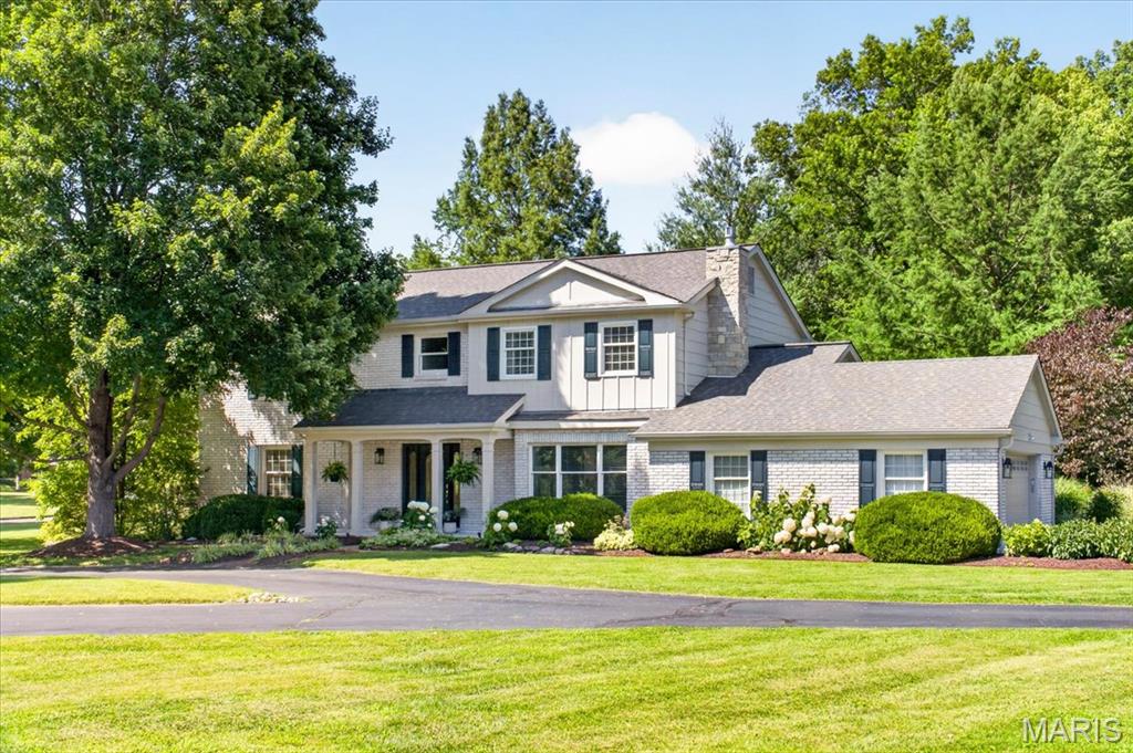 Nestled on a picturesque 1.18-acre corner lot in prestigious Thornhill Estates, this beautifully updated 2-story offers the perfect blend of timeless elegance and modern comfort. From the impressive two-story foyer and rich hardwood flooring to the extensive millwork, abundant natural light, and sun-filled living spaces, every room has been thoughtfully designed. The beautifully appointed kitchen features custom cabinetry, granite countertops, stainless steel appliances, double ovens, a spacious center island, and a generous breakfast area. Bathed in natural light from expansive sliding glass doors overlooking the private pool, the kitchen serves as the heart of the home while offering seamless access to both the formal dining room and inviting family room, where oversized windows frame peaceful views of the lush backyard. Upstairs, the luxurious primary suite offers a completely renovated spa-inspired bath and an exceptional custom walk-in closet, while three additional generously sized bedrooms provide space for family and guests. The finished lower level adds incredible flexibility with expansive recreation space, a full bath, and dedicated exercise area. Step outside to your own private retreat featuring a sparkling in-ground pool, expansive patio, lush landscaping, and mature trees that create exceptional privacy. Complete with a circular driveway, side-entry garage, and access to Thornhill Estates' neighborhood pool, tennis courts, and clubhouse, this is a rare opportunity to own an exceptional home in one of Town & Country's most sought-after communities.