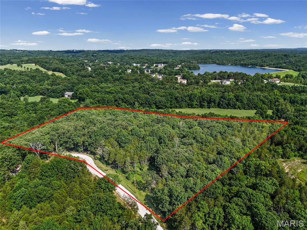 Bring your dream home to life on this stunning 10-acre property tucked away at the end of a private cul-de-sac in the highly sought-after Hillsboro R-III School District! Enjoy the peace and privacy of country living while still being just minutes from multiple highways, offering an easy and convenient commute.
With plenty of space to design the lifestyle you’ve always envisioned, this property offers endless possibilities. Build your custom home with a walkout basement, add an outbuilding, install a pool, or create the ultimate outdoor entertaining space—and yes, bring your horses! Why travel for vacations when you can create your own private retreat right at home?
No mobile homes allowed, 1,500 sq ft. minimum, and you can divide the property into two 5-acres parcels.
Opportunities like this are rare. If you’ve been searching for the perfect blend of privacy, acreage, and location, you've found it!