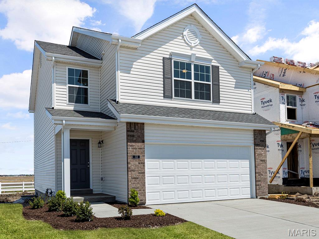 New McBride Homes 2 story Arlington 3BR, 2.5BA will be ready this fall! Walkout homesite! 6’ windows & wood laminate flooring throughout main living area. The kitchen features level 4 Winstead Burlap 42” tall cabinets, quartz countertops, & stainless-steel GE appliances. The breakfast area opens to the backyard, and the living room features a large window & ceiling fan. The primary suite features 2 walk-in closets & private bath w/5’ walk-in shower. 2 more bedrooms w/walk-in closets and a full bath add convenience. Extras include white 6 panel doors, ceiling fan prewires, main floor powder room, 2-car garage w/coach lights, & more! Nestled in Truesdale right outside Warrenton, Elkhorn Ridge is in one of the most highly sought-after areas in Warren County. The neighborhood is also just minutes away from shopping, restaurants, grocery stores, and more. Enjoy peace of mind with McBride Homes’ 10 year builders warranty and incredible customer service! Display photos shown.