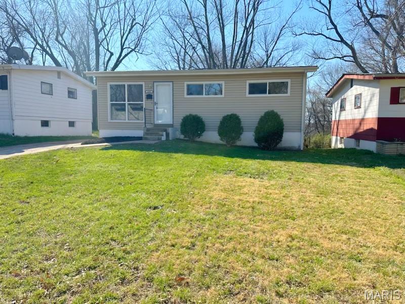 This home has been tastefully updated and is move in ready. Kitchen has been updated with new white cabinets countertop and stainless steel appliances that are included in the sale. ALL new flooring throughout , completely updated bath, New furnace installed in 2026 AC unit will be serviced before closing. Partially finished basement offers second living area or hangout room.