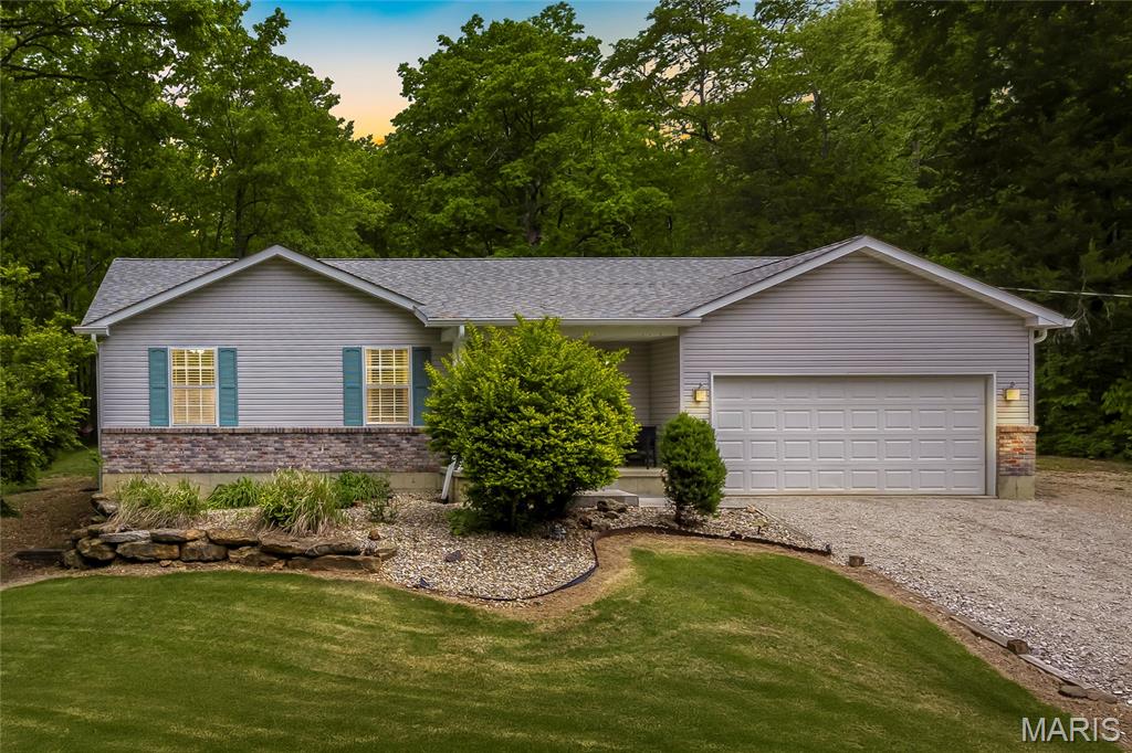 Welcome to 4041 Canebrake Valley Drive in Dittmer, a well-cared-for home set on over 3.5 acres with peaceful views and frequent deer sightings right in your own yard. This 3-bedroom, 2-full-bath home features an open floor plan designed for comfortable everyday living and easy entertaining. The walkout basement includes a framed-in rough-in for an additional bath, offering great potential for future finished space. Step outside and enjoy the concrete patio outdoor living area, perfect for relaxing, gathering with friends, or taking in the beauty of the surrounding property. With its modern layout, private setting, and room to grow, this home offers the best of country living.