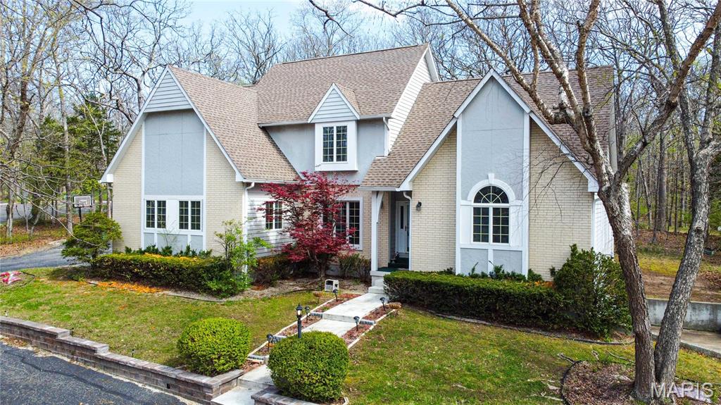 Spacious 6BR/4.5BA home on corner lot in prestigious Oak Knoll subdivision.  5345 sq ft break down (main & upper-3495, finished LL-958, storage rms LL-892). Home has main floor master bedroom, master bath with Jacuzzi, separate shower & walk-in closet; cathedral ceilings in living room with beautiful hardwood floors.  Kitchen has cooking island w/sunny eat-in breakfast room w/skylights and view of the deck & mature wooded lot.  Main floor has formal dining room, laundry, office/den, & bonus room.  Upper level has 4 BR, 2 full BA, walk-in closets, & 2 finished storage rooms.  Full walk-out basement with a 1 full BA, rec room, bedroom, & additional unfinished storage rooms great for storage or recreation.  Custom-built shelving and cabinets in main office, second office, and upper level bedroom.  3 car garage-644 sq ft--has shelving and circle driveway. Brand new roof is being installed.