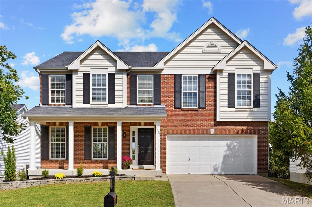 Completely renovated and absolutely stunning, this spacious two-story has been thoughtfully transformed from top to bottom. Beautiful hardwood floors welcome you inside and continue into the light-filled family room, where a wood-burning fireplace framed by custom built-ins creates a warm and inviting focal point. The dining room is equally impressive with classic wainscoting, new carpet and a statement chandelier. The completely redesigned kitchen is a showstopper with custom soft-close cabinetry, quartz countertops, a striking tile backsplash, stainless steel appliances and a large peninsula with plenty of seating. Floating shelves, under-cabinet lighting, a beverage refrigerator and pantry add thoughtful touches throughout. Even the adjoining laundry room has been beautifully finished with custom cabinetry, quartz countertops, tile backsplash and a utility sink. Upstairs, the oversized primary suite offers an incredible amount of space with new plush carpet and a generous walk-in closet. The updated primary bath features a new dual-sink vanity, soaking tub and separate shower. Three additional spacious bedrooms and an updated hall bath complete the second floor. The finished walkout lower level adds even more living space with luxury vinyl plank flooring, recessed lighting and an electric fireplace flanked by built-ins. The expansive recreation area offers plenty of room to gather, while an additional bedroom could just as easily serve as a home office, fitness room or bonus space. A full bath and walkout to the backyard complete the lower level. And then there’s the view. The freshly stained deck overlooks a fully fenced backyard bordered by trees and common ground, creating a beautiful backdrop and wonderful sense of privacy. Whether you’re enjoying your morning coffee or watching the sunset in the evening, it’s a setting you’ll appreciate every single day. With extensive updates throughout, this home is truly move-in ready and waiting to be enjoyed. Located in the top-rated Rockwood School District and close to popular shopping, dining, parks and more, this is one you won’t want to miss.