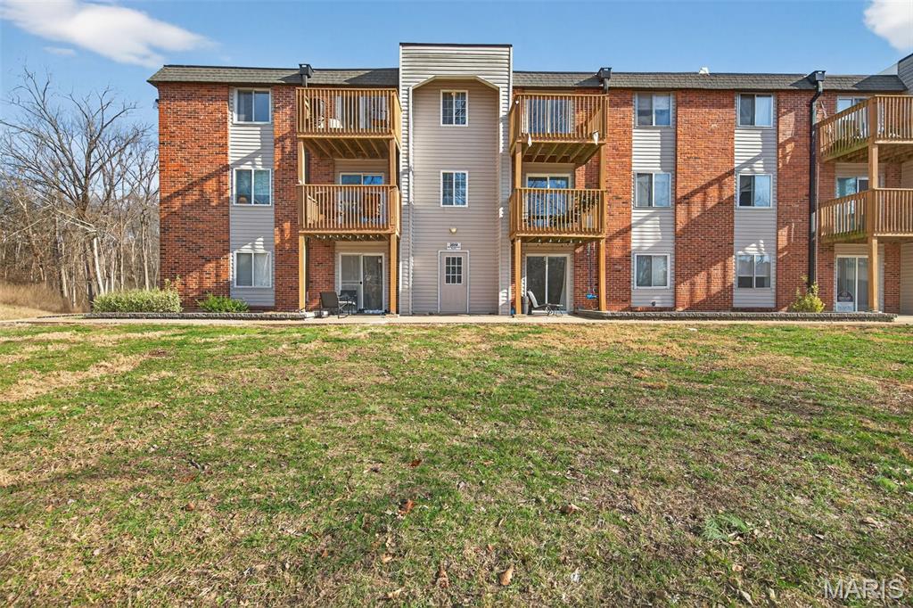 This second-floor Oakville condo offers a fantastic opportunity to own a thoughtfully updated, move-in-ready 2-bedroom home with low-maintenance living. Enjoy access to community amenities including a pool and clubhouse, perfect for relaxing and entertaining during the warmer months. The condo fee includes water, sewer, trash service, exterior maintenance, snow removal, lawn care, designated parking, and select insurance, making ownership simple and stress-free.

Inside, the home features fresh paint, new flooring, and new windows throughout, creating a bright and modern atmosphere. The generously sized living room opens to a private balcony through a new sliding glass door, where you can unwind while overlooking a serene, park-like setting.

The updated eat-in kitchen is both functional and stylish, offering stainless steel appliances, attractive cabinetry, a beautiful backsplash, ample counter space, a breakfast bar, and a large pantry. In-unit laundry adds everyday convenience. Two spacious bedrooms provide plenty of closet space and natural light, while the full bathroom has been tastefully renovated.

A corner unit with tons of natural light, tasteful updates and desirable amenities, this well-maintained condo is truly move-in ready. Be sure to schedule your private showing today!