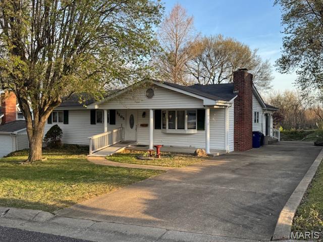 Price Reduced Substantially Below Appraised Value!  Looking for a home in the city limits of Washington on a quiet street?  Check out this spacious ranch home that features 3 bedrooms, 1.5 baths, large kitchen with center island and oak cabinets adjoining the dining area, living room with propane fireplace, main floor laundry room and a spacious family room with large windows overlooking the private back yard.  There's also a recreation room adjacent to the family room to enjoy billiards or other activities.  The oak benches in the recreation room are included in addition to the billiard lighting!  The billiards table is not staying with the home.  There is off-street parking with access to the back yard storage shed which is supplied with 60b amp service.  The unfinished basement is furnished with a storage area with shelving, a workshop area and a separate area ready to finish off into an additional living area.  There's over 2300 square feet on the main floor, a recent updated electrical panel box, newer water heater and an approved city occupancy permit.  This home is ready to make it your own,