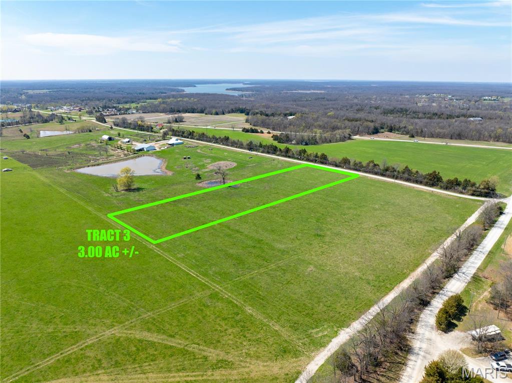 Location, Location, Location!!  This 3 acre tract is the perfect location for you Mark Twain Lake getaway!  Located just off Highway J, this tract is close to all lake amenities.  Be to Jellystone Park, Spaulding Beach & Boat Ramp, Blackjack Marina, Cannon Dam and restaurants within minutes!  This 3 acre tract is being sold unrestricted, so the possibilities are endless!  Build your dream shouse, lake cabin or create your family RV getaway.  With water on the property and electric and fiber at the road you are set up for convenience to get your dream property set up quick and affordably.  Four (3 acre) tracts are available in total, buy one or all four!  This would be an excellent location for a small campground or boat storage!!   Call today before this one is gone!!
