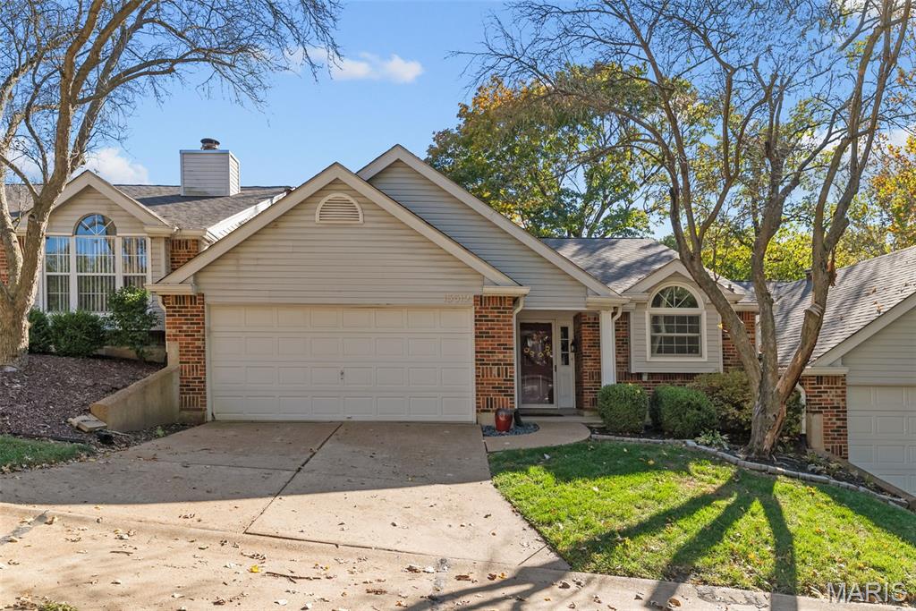 **Seller to cover first 6 months of HOA expenses**Tucked away on a quiet street in Chesterfield, 13312 Wood Chapel Dr offers the perfect blend of modern comfort and maintenance-free living. This 2-bed, 2-bath townhouse features an open floor plan with vaulted ceilings and luxury vinyl plank flooring throughout. The updated kitchen is outfitted with custom cabinetry, stainless steel appliances, and sleek finishes — perfect for everyday living or entertaining. Both bathrooms have been fully renovated, including a spa-like primary suite with a floor-to-ceiling tiled shower. Recent upgrades like brand new Andersen windows (with transferable warranty), updated HVAC systems, and a walkout basement add lasting value and peace of mind. You'll love the oversized 2-car garage, private backyard space, and unbeatable location — walkable to local restaurants, with immediate highway access, and zoned for top-rated Parkway schools. Ideal for downsizers or busy professionals, this move-in-ready home is prepped and waiting for you before the New Year.