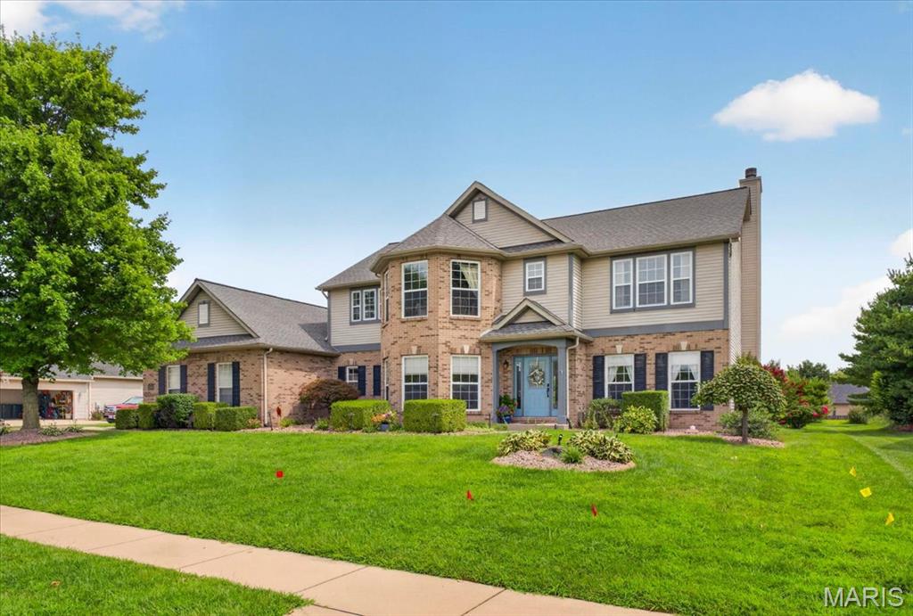 4,500sq ft of luxury living on almost half an acre

Welcome home to this stunning 5-bedroom, 4.5-bath estate tucked into the prestigious Woodfield Lake Estates, offering the perfect blend of elegance, comfort, and everyday convenience. Ideally located just minutes from Scott AFB, O'Fallon dining, Green Mount Crossing shopping, hospitals, and parks — with easy access to the neighborhood's private fishing lake and walking trails — and only 16 miles to downtown St. Louis, this home puts you close to everything while feeling worlds away.

Step through the custom front door by Wilke, into a soaring two-story Grand Foyer framed by classic pillars. Throughout the main and upper levels, 9-foot ceilings, porcelain plank flooring, recessed LED lighting, and custom blinds set an unmistakably upscale tone. 

The custom kitchen is a showstopper, featuring granite countertops, newer appliances, an eat-at island, filtered drinking faucet, tile backsplash, and a walk-in pantry with an etched glass door. Gather in the vaulted-ceiling Morning Room, complete with electric remote-controlled blinds, or unwind by the fireplace in the living room with its granite surround inlay. Read or respond to emails in the office/study complete with built-in bookshelves. A half-bath and laundry room with utility sink complete the main level.

This home comes move-in ready with an incredible list of extras included: a huge flat-screen TV, Dolby ATMOS 7.1 surround system with receiver and amp, luxurious leather reclining theater sofas, and a mini-fridge in the home theater — plus a mounted projector, TV in the 5th bedroom, a pool table, and a refrigerator in the family room. The living room is wired with 5.1 surround sound for effortless entertaining.

Beautifully landscaped, the level, nearly half-acre lot is an entertainer's paradise. Enjoy a custom patio with a waterfall feature and an oversized wood-burning fire pit. A multi-zone irrigation system keeps the grounds pristine.

Modern systems throughout include dual-zoned NEST thermostats, an HVAC humidifier, a whole-home water filter, a sump pump, and a PASS-monitored security system.

The oversized 3-car garage offers four tool cabinets and attic storage, while additional built-in shelving throughout the home keeps everything organized. A rough-in for a wet bar on the lower level adds flexibility for future expansion — perfect for a second living space, in-law suite, or entertainment hub.

This exceptional home offers a rare combination of luxury finishes, thoughtful upgrades, and an unbeatable location. Schedule your private showing today.
