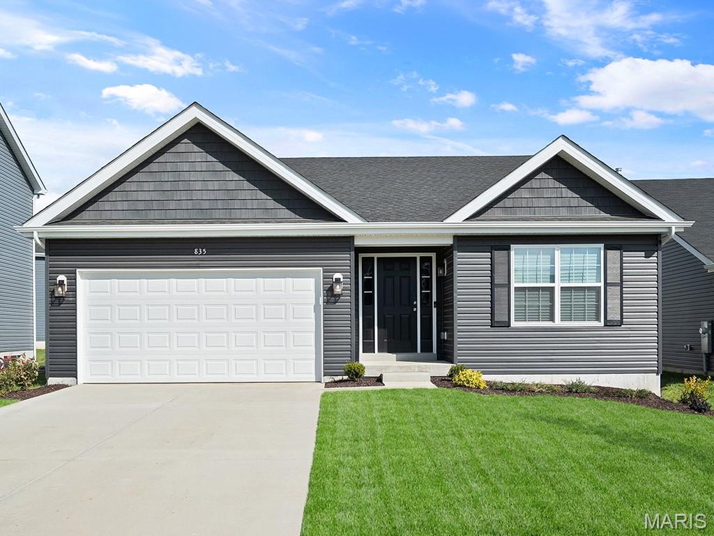 McBride Homes’ Aspen II 3BR, 2BA ranch-style home ready this winter! Craftsman exterior! Enjoy an open floorplan with vaulted ceilings, 6ft windows, & beautiful wood laminate flooring in main living areas. The kitchen has a large island with a breakfast bar, level 4 Landen Burlap 42” cabinets, quartz countertops, stainless steel GE appliances, & large walk-in pantry. The dining area has a sliding glass door that leads to a future covered patio area with a ceiling fan prewire. The primary suite has a large window, dual closets, & private primary bath w/double sinks & walk-in shower. Other extras include main floor laundry, ¾ bath rough in at LL, upgraded lighting/plumbing fixtures, six panel white interior doors, ceiling fan prewires, plus garage coach lights. This community features 105 total homesites with several cul-de-sac homesites and sits adjacent to Koch Park. Enjoy peace of mind with McBride Homes’ 10 year builders warranty & incredible customer service! Similar photos shown.