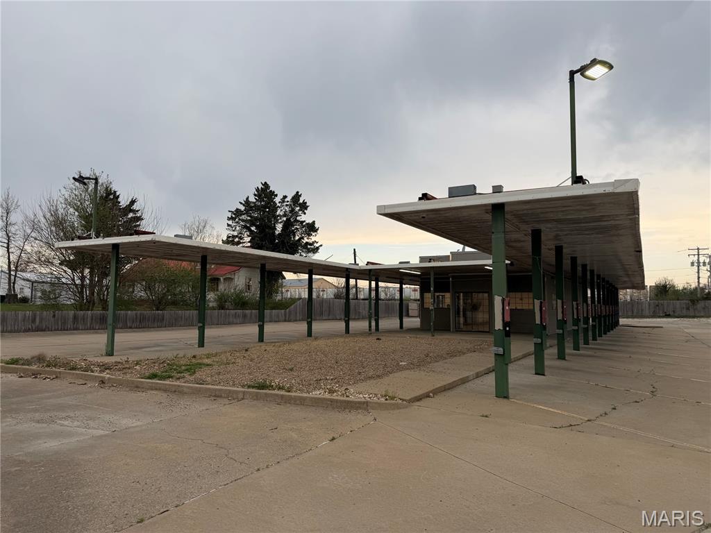 Positioned near the high-traffic intersection of Lincoln Drive and E. Cherry Street, this former Sonic Drive-In offers an excellent opportunity for a quick-service restaurant or drive-in concept. The property is already equipped for food service operations and features a walk-in cooler and freezer, two commercial kitchen hoods, 23 awning-covered parking stalls, plus additional uncovered parking. The most recent tenant vacated in early 2026, making the property ready for its next operator. Excellent visibility, convenient access, and an established restaurant layout make this a standout leasing opportunity.