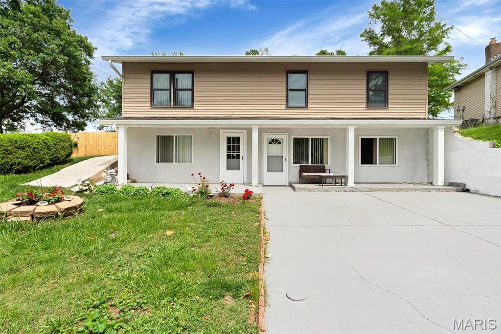 Tucked away in a quiet South County neighborhood within the Hancock School District, this gem offers flexibility that is hard to find. As you walk through, you'll notice the updated luxury vinyl plank flooring, stainless steel appliances, two kitchen areas, and a finished lower level with a bedroom, and a full bathroom. The upstairs unit offers 3 beds and 2 full baths, with a living area, and also a fair sized kitchen.

Step outside to enjoy the fenced backyard with plenty of space to relax, entertain, or let pets play. Also, when it's hot outside, enjoy the above ground pool that is 18'. Major updates completed approximately 7 years ago including the roof, siding, fascia, porch, retaining wall, HVAC system, and bathroom. You are just minutes away from Telegraph Road, shopping, restaurants, parks, and Jefferson Barracks Park.

This home is currently classified as a single-family residence. However, Owner is in the process of applying for duplex approval with the county. Buyers should verify any intended use directly with the county.