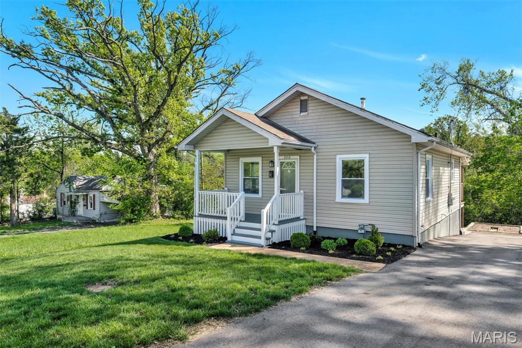 No pets permitted. Charming and fully updated 2-bedroom, 1-bath bungalow available for 1 year lease at $1,450/month! This move-in ready home offers off-street parking with an extended driveway accommodating multiple vehicles, a welcoming covered front porch, and a private backyard patio backing to woods for added privacy and a peaceful setting.

Inside, you’ll find updated hardwood and laminate flooring throughout, an updated kitchen with stainless steel appliances, tile backsplash, dishwasher, refrigerator, and a rare walk-in pantry offering exceptional storage space. The finished lower level features a spacious family room ideal for entertaining, relaxing, or additional living space, along with extra storage and a dedicated laundry area with washer and dryer included.

Additional features include updated bathroom finishes, generous closet space, ceiling fans in both bedrooms and the living room, plus central air and furnace for year-round comfort and efficiency.

Enjoy outdoor space with room for gardening, entertaining, or simply relaxing in the quiet backyard setting.

Lease terms: $1,450/month. First month’s rent, last month’s rent, and a $1,450 security deposit due at move-in. Showings by appointment only — please do not trespass. Seeking clean background, income, and credit score above 650.  

Application available. Applicant responsible for $49.99 application fee.  https://apply.link/18rl7bY