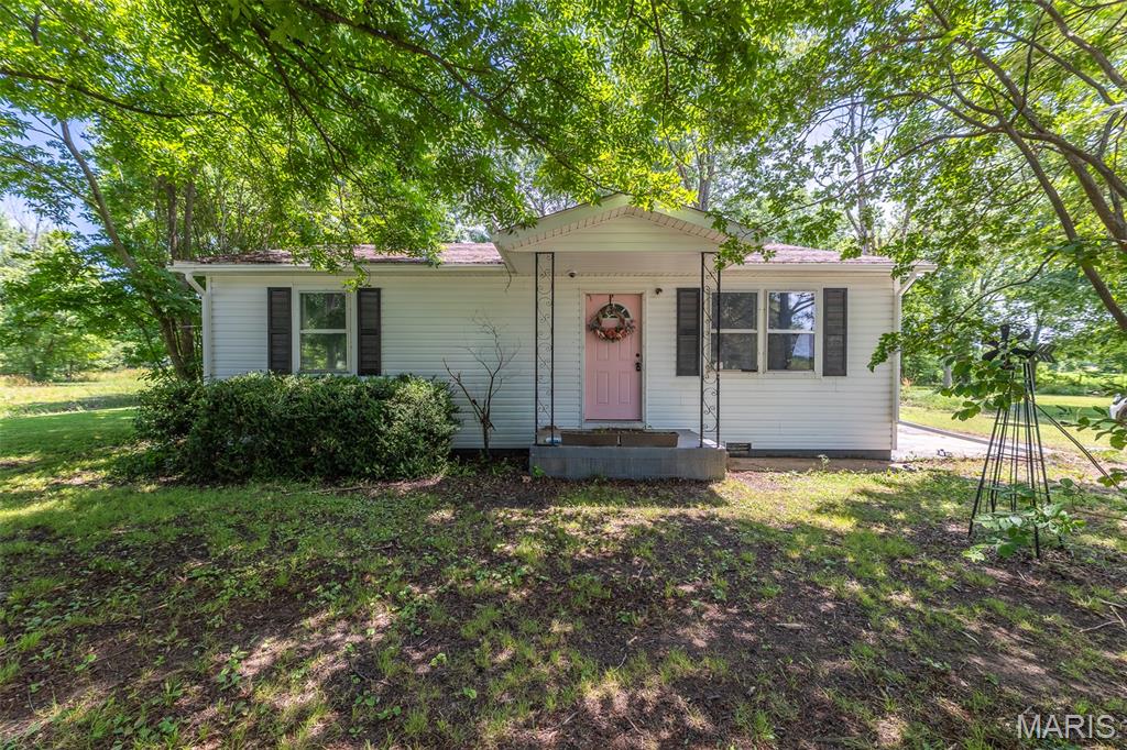 Adorable 3-bedroom, 1.5 bath home on 1.76 acres with a detached shop building! This charming property with mature pecan trees offers the perfect blend of comfort, space, and versatility. Whether you’re looking for room to spread out, tackle projects, or simply enjoy the outdoors, this property is full of possibilities.