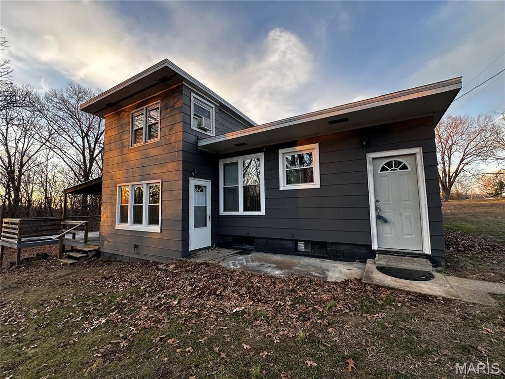 Very desirable, large house outside of town. Get the privacy and space you've been looking for! This home features a large back covered deck that backs up to a private wood line. The two story includes 2 bedrooms and 2 additional bonus rooms that can be used as bedrooms. The living room features a charming wood burning fireplace that you can nestle up to all winter long. 

Home has a couple of the major updates out of the way, newer furnace and windows, both installed in last five years. New exterior paint. Newer flooring in most of main floor. Kitchen has been tastefully remodeled and has stainless steel appliances including a gas stove!

In addition to the spacious house, the property also has a perfect little workshop with plumbing, electric and A/C! Also, a  small wood shed as well to keep that fireplace well fed. 

This home has a lot to love at a price to sell!