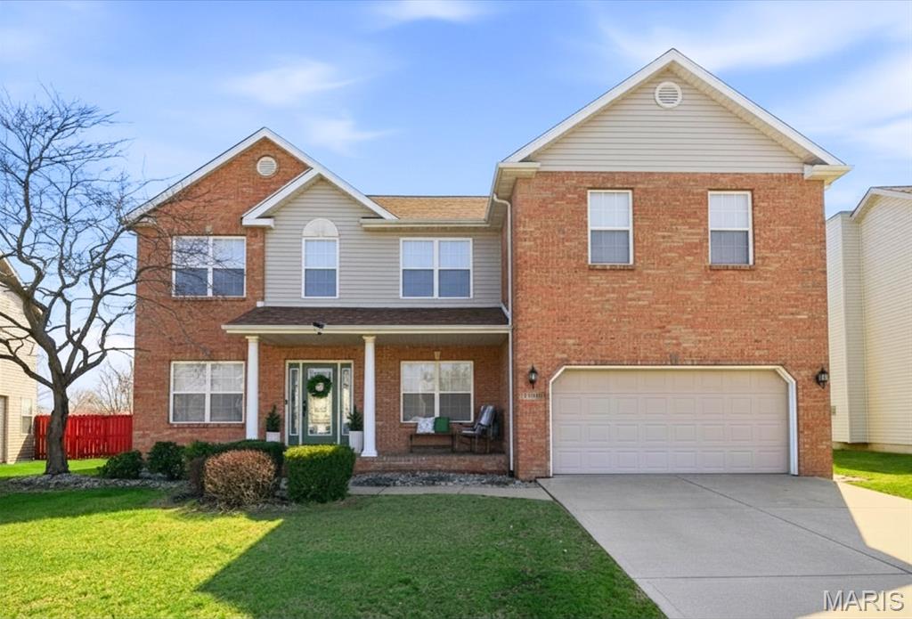 Asked AND answered! A move in ready home in Savannah Hills under 425,000!  Come snag this home in one of O'Fallon's most loved neighborhoods! BEAUTIFUL 2 story 4 bedroom and 3-bathroom home with 3100 square all above ground! Spacious, open floor plan with 9-foot ceilings on the main level. You'll love the curb appeal of the front porch and glass accent door that opens into the spacious foyer. Inside, a separate dining room is perfect to host company, in addition to an office or flex room of your choice. Newer flooring throughout the entire home for easy care and clean feel. Large picture window above the scissor staircase provides ample light into a generous sized living room that opens to an updated kitchen and eat-in breakfast area. Backsplash, solid surface counters and neutral color cabinets leave the kitchen area feeling bright and modern! Main floor laundry and half bathroom! Upstairs you will find a HUGE loft space with all 4 bedrooms and 2 full bathrooms. Primary bedroom accents include tray ceiling and en-suite with dual adult height vanities, separate standing shower, soaker tub and dual closets.  Good sized spare bedrooms with walk-in closets. Step outside to a fully fenced backyard with no rear neighbors, giving you the kind of privacy that's hard to find. Think quiet mornings with coffee or evenings grilling with friends on a beautiful stone patio with shaded pergola. You have plenty of room ALREADY -AND a full unfinished basement for any future expansion needed! Ease of mind updates: new siding, new roof and new windows in the back of the home. Savannah Hills offers fantastic neighborhood amenities including a community pool, park, and walking trails, making it easier to enjoy the outdoors closer to home.
