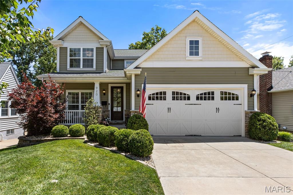 Summer time and the livin's easy in this 8 year old home in walkable Kirkwood! Just a short stroll to all three schools, as well as downtown Kirkwood. The builder intentionally designed every space in the home, with a sprinkle of customization throughout. Admire the wainscoting and chair rail through the halls, dining room and stairs, and the tray ceilings in the dining room and primary en suite. Each feature makes this home far from your cookie-cutter new build. The current owner added their thoughtful touches with the tasteful custom gates to match the staircase to keep pets and little ones safe, as well as the chic wallpaper in guest bath and dining room, plantation shutters, and the extended paver stone patio in back just to name a few. The main floor allows for life as you like it, with options to use the front room as a playroom, office, or library, as well as just the right amount of open concept to flexible in arranging furniture to open or close rooms to the eat-in kitchen as you desire. The kitchen is a delight in finish and function as it showcases a neutral color pallet, quartz counters and island paired with custom tile work, a focal point range hood, brilliant overhead and under cabinet lighting, and spacious pantry. With four bedrooms and two bathrooms upstairs, including the primary en suite, the sleeping areas are quiet and comfortable set away from the entertaining spaces. The primary en suite includes tray ceilings, a large walk-in closet, as well as a spacious bath with double vanity, soaking tub, and custom tile/glass shower. The hall bath includes a convenient double vanity and sharp subway tile shower surround. A walk-out basement adds over 600sqft of additional finished space, but plays even larger with a deep foundation pour making the rooms feel even larger - maybe a full golf swing height for that simulator you wanted?! The basement also plays host to bedroom 5 and the connected 3rd full bath perfect for a guest bedroom. The walk-out basement windows and door bring an abundance of light in, and provide a great view of the expanded paver stone patio, engineered deck, and flat, fenced-in yard. So much room for activities! This home has all of the bells and whistles to check the boxes and provides the custom details you deserve! Start your next chapter in this lovely Kirkwood home!!