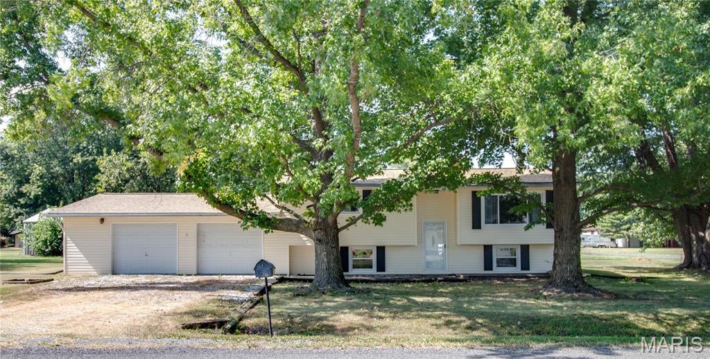 Great opportunity on the edge of Jerseyville! This spacious home offers plenty of room to make it your own while keeping affordability in mind. The home currently features two bedrooms with additional space that could be finished or reimagined to accommodate more bedrooms, a home office, hobby room, or whatever best fits your needs.

The open-concept kitchen, dining, and living areas create a comfortable, spacious setting for everyday living and entertaining. Outside, you’ll appreciate the oversized 2 car garage and back deck, providing additional space for storage, projects, relaxing, or gathering with friends and family.

Recent improvements include a new roof and downspouts installed in September 2026, giving the next owner a great head start on updates. To make putting your own finishing touches on the home even easier, the sellers are offering a $3,000 flooring allowance.

With generous space, flexibility, recent exterior improvements, and a location on the edge of Jerseyville, this property offers plenty of potential at an affordable price!