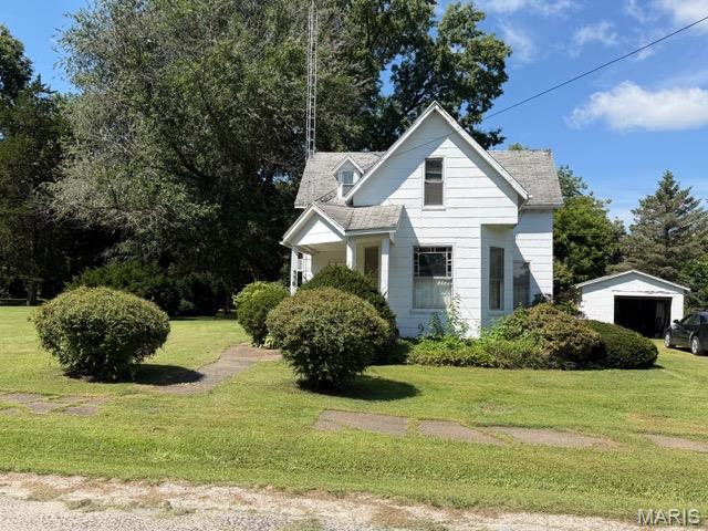This may be an older home, but it has potential!!  If you are a handyman, you will want to take a look at this property! It is affordably priced, 1 1/2 story home with potentially 4 bedrooms, living room, dining room, kitchen and one bath along with a partial basement and a detached garage on 3/4 of an acre.  You will love this beautiful back yard with mature trees for shade, lots of perennials and flowers.  Don't miss this opportunity!!!