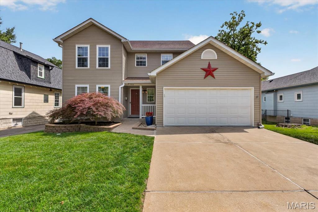 Tucked into the heart of University City, this beautifully maintained 3-bedroom, 2.5-bath home offers the kind of modern ease and everyday livability that can be hard to find in such a central, established location. With just over 1,800 square feet, an attached two-car garage, newer systems, and a thoughtful floor plan, the home feels polished, comfortable, and exceptionally well cared for from the moment you arrive.

The main level is warm and inviting, with hardwood floors, generous natural light, and a living room anchored by a gas fireplace. The spaces feel connected without losing their sense of purpose, creating an easy flow for both quiet evenings at home and entertaining. The eat-in kitchen is especially well appointed, featuring dark cabinetry, granite countertops, a tile backsplash, stainless steel appliances, a gas range, and plenty of space for gathering around the table.

Upstairs, all three bedrooms are thoughtfully placed on the second floor along with a full laundry room, making daily living simple and practical. The primary suite feels spacious and serene, with vaulted ceilings, a walk-in closet, and a private bath featuring a double vanity, walk-in shower, and separate soaking tub. Two additional bedrooms and a second full bath complete the upper level with comfort and flexibility.

The lower level offers clean, usable storage and additional possibility, while the exterior brings another layer of charm. The fenced backyard has been beautifully landscaped and designed for enjoyment, with a patio for dining or relaxing outdoors and a dedicated area where a hot tub could be added. It is private, lush, and low-maintenance in all the right ways.

With a rare attached two-car garage, a gas range, gas fireplace, newer systems, and a level of care that is immediately apparent, this is a home that does not ask much of its next owner beyond moving in and adding their own personal touch. Moments from downtown Clayton, the Delmar Loop, the new Olive Corridor developments, major highways, restaurants, parks, and neighborhood amenities, this home offers a rare combination of convenience, comfort, and understated sophistication in one of the area’s most connected locations.