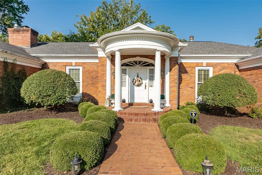 Classic architectural details and a stunning setting on a 1.8-acre property in the heart of Ladue---all the hallmarks of one of the best opportunities available in our Fall Market! The outstanding lot is ideal for buyers looking for the perfect Ladue setting for their dream home. It also offers an unparalleled opportunity for buyers looking to update beautiful, existing construction. The exquisitely detailed 3-bedroom, 3.5 bath home features 5,000+ sq ft of living space, with gorgeous moldings, soaring ceilings, hardwood floors, three gas fireplaces and fabulous millwork throughout. The floorplan features a wide, gallery-style entrance leading to a very spacious living room with floor to ceiling windows and a gas fireplace. The elegant dining room is highlighted by a large bay window overlooking the private, tree-lined backyard. A show-stopping paneled library is everyone's favorite room in the house. The kitchen and breakfast room include stainless appliances and granite counters and overlooks a lovely brick patio. The two main level bedroom suites are well appointed and spacious--the primary suite includes a gas fireplace and charming dressing room, ample closets and built-ins. The lower level includes a third ensuite bedroom, 2 cedar closets, laundry room and jaw dropping unfinished storage.  A mudroom and oversized 2-car garage complete the floorplan. This estate is offered in as-is condition. Please call listing agent with questions.