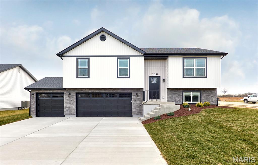 BRAND NEW home with every option you could imagine! They include vaulted ceilings, rounded “bullnose” corners, granite or quartz countertops, stainless steel appliances, 42" cabinets with "cushion close", custom neutral-colored paint job throughout, LVT flooring throughout most of the home, framed windows, taller baseboards, adult-sized cabinets in bathrooms with marble countertops, walk-in closets, upgraded carriage garage doors with openers on 3 CAR Garage, full bath rough-in, panel doors (many varieties), and upgraded water/light fixtures throughout the house! MAIN FLOOR laundry! Fully sodded yard (front/sides/back). *Pictures are of previously built homes. Builder/Broker* This home is USDA eligible.