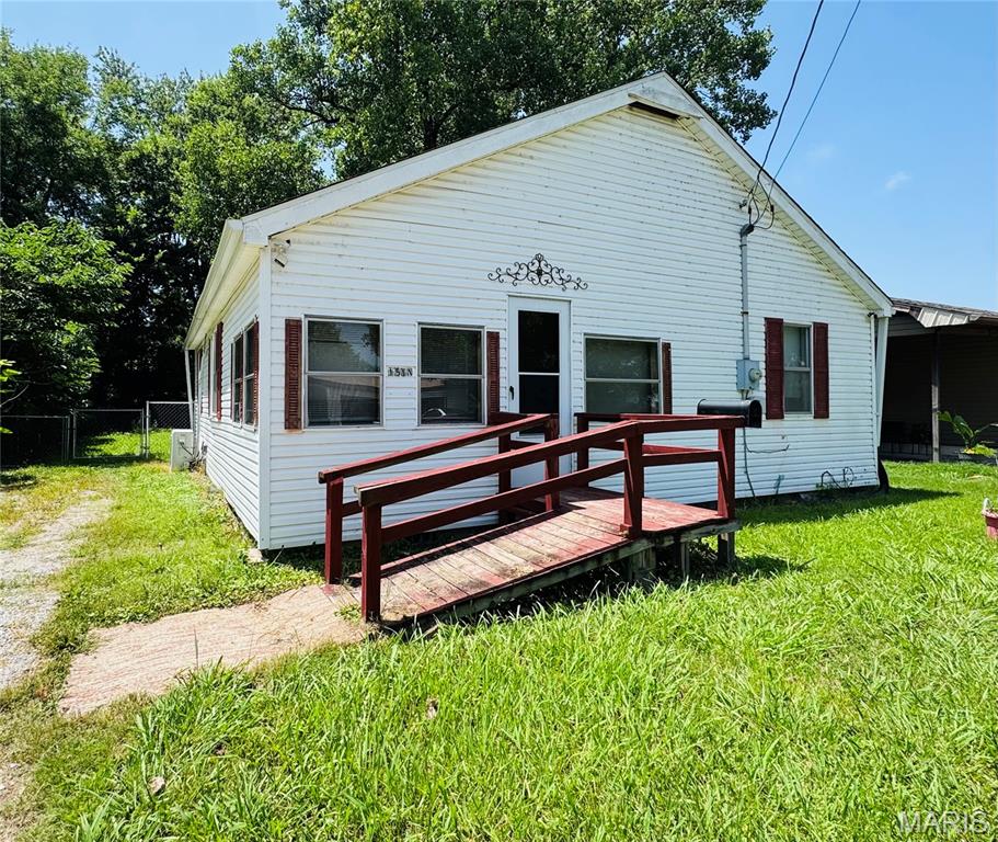 Move-in ready 3-bedroom, 1 bath home with hardwood floors! builtins, sunporch, front porch, and a fenced-in back yard. Will go USDA, VA, and FHA.