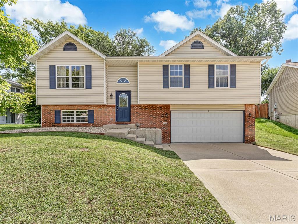 Welcome home to this beautifully maintained 3-bedroom, 3-bath home nestled on a quiet cul-de-sac in the desirable Village Gardens neighborhood! From the moment you step inside, you'll appreciate the move-in ready condition and inviting layout. The open living and dining areas provide the perfect space for everyday living and entertaining. The generously sized kitchen offers abundant cabinet space and plenty of room to prepare meals and host every holiday.

The primary suite features a private ensuite bath, creating a comfortable retreat at the end of the day. The finished lower level adds even more living space with a cozy family room complete with a fireplace and bathroom. You can utilize this level in so many ways!  A versatile bonus room that's perfect for a home office, workout room, playroom, or guest space.

Storage is plentiful throughout the home, and the oversized garage provides even more room for vehicles, hobbies, and organization. With tasteful updates, a functional floor plan, and a peaceful location, this home is truly move-in ready. Don't miss your opportunity to see this beauty!
