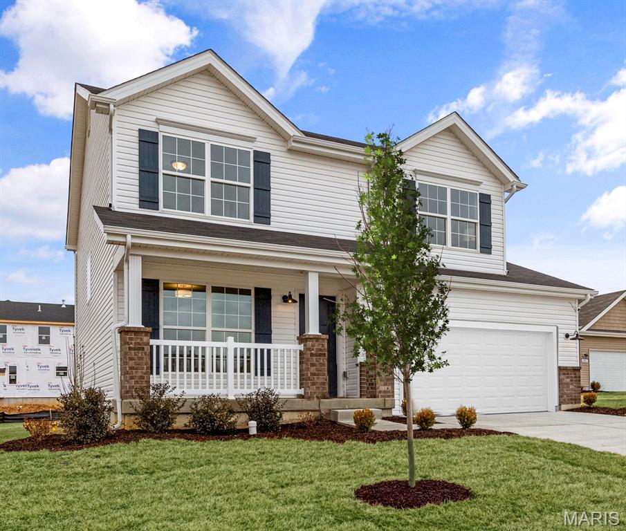 McBride Homes Sterling DISPLAY HOME IS READY NOW! This 4BR 2.5BA home is perfect for entertaining with wood laminate flooring & 6ft windows on the main level. Off the foyer is a flexible living room or home office, plus a large family room w/ceiling fan, extended kitchen & powder room. The kitchen features a center island w/extended top, quartz countertops, 42” Level 4 Brellin White cabinets, walk-in pantry & stainless steel GE appliances. Dining area includes a built-in desk w/glass uppers & sliding glass door to the backyard. Upstairs the primary suite w/ceiling fan, walk-in closet & private bath w/walk-in shower, double sinks & linen closet. Three additional bedrooms, full bath & second-floor laundry add convenience. LL includes a ¾ bath rough-in for future finish. Liberty features a private walking trail with lake, gazebo, & acres of beautiful common ground.