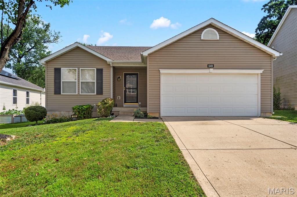 Introducing 549 Rifle Ridge Drive! This incredible 3 bedroom 2 bath ranch is ready for you to call it home.  Nestled in the lovely Fox Ridge neighborhood, with easy access to Lake St Louis, Wentzville Parkway, and Highway 70.  The exterior offers maintenance free vinyl siding, architectural shingle roof, a large level fenced yard with custom patio for relaxing outdoors and lovely landscaping for the avid gardener.  The interior offers a spacious open floorplan. The kitchen features a large center island with breakfast bar, corner pantry and stainless steel appliances (all included).  The primary suite offers private ensuite bathroom & walk in closet.  2 additional bedrooms, hall bath and main floor laundry with washer and dryer complete this comfortable layout.  This home is conveniently located and move in ready.  Schedule your showing today!