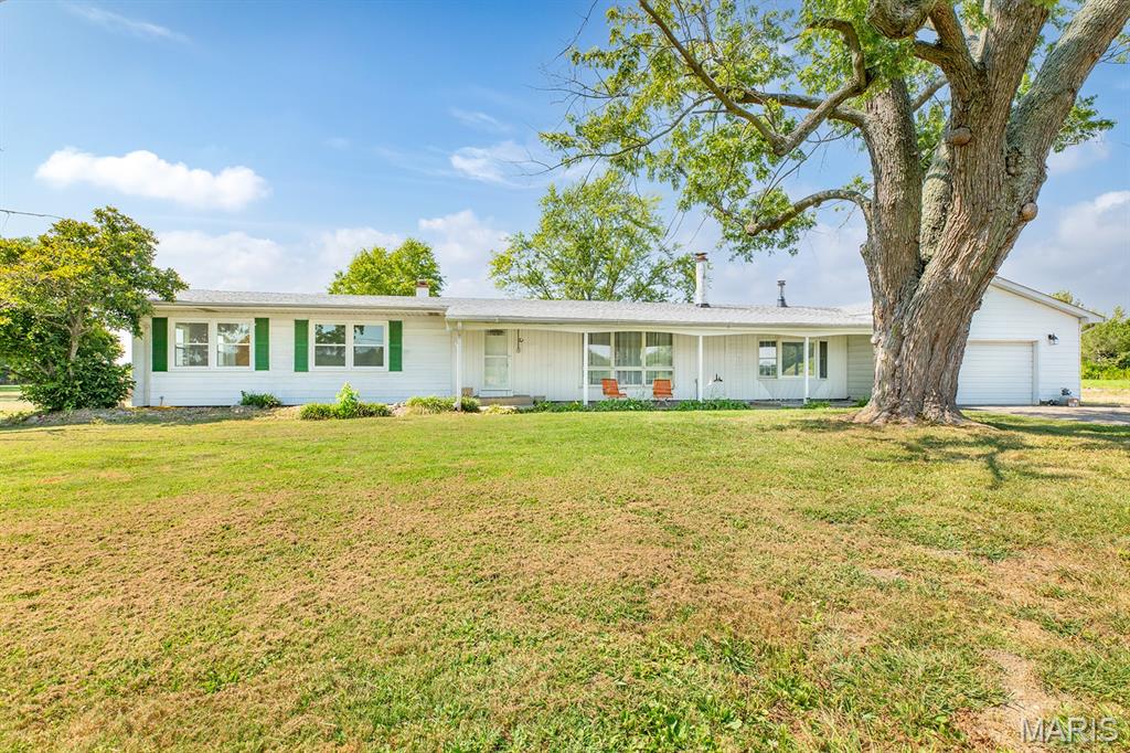 Welcome home to this beautifully remodeled 3-bedroom, 2-bathroom ranch situated on an impressive 5.8-acre property! Featuring a spacious family room and an open-concept floor plan, this home offers the perfect setting for entertaining family and friends.

The property also includes a 2-car garage and plenty of acreage to enjoy the privacy and space of country living while remaining conveniently located just minutes from town and Interstate 255.

This is a rare opportunity to enjoy a move-in-ready home with room to spread out, all while staying close to everyday conveniences and major roadways.
Call today to schedule your private tour and see everything this property has to offer!