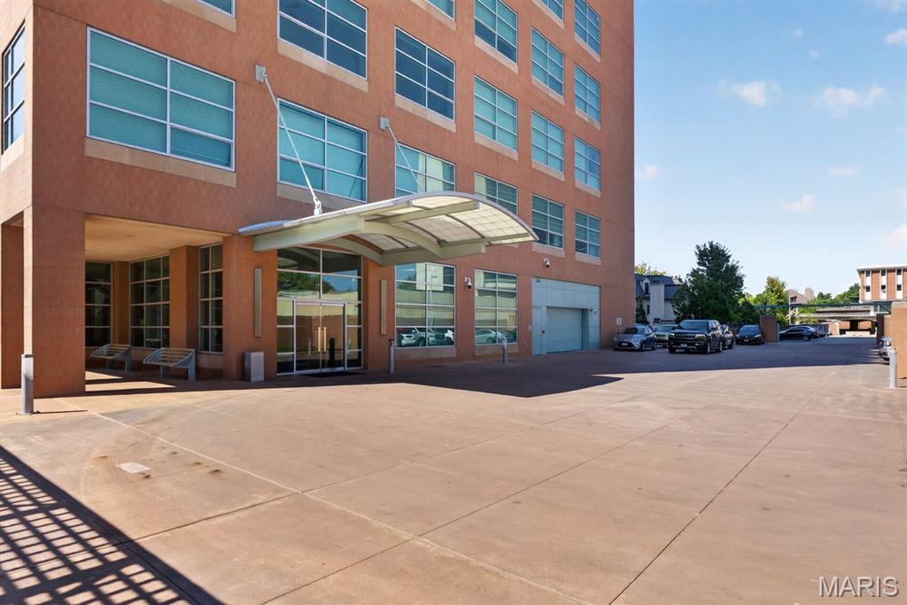This exceptional Maryland Walk condo offers a thoughtfully designed layout and beautiful finishes throughout. A welcoming entry hall features a coat closet and separate washer/dryer closet before opening into the spacious main living area. The updated kitchen is both stylish and functional, featuring a large center island and an abundance of cabinetry, with an adjacent dining area and generously sized living room. Large windows throughout the condo fill each room with natural light. The spacious primary suite offers a luxurious retreat with a large bathroom featuring dual sinks, a separate soaking tub and shower, and a walk-in closet. Two additional bedrooms share a full hall bathroom. Enjoy your own private patio space, along with two parking spaces in the secure garage and a dedicated storage locker. Maryland Walk offers impressive amenities, including a remodeled roof top indoor/outdoor gathering space, fitness center, swimming pool, private office spaces, renovated second floor lounge area and three private guest rooms. Ideally located near an array of restaurants, boutiques, parks, and schools, this truly exceptional condo offers the perfect combination of comfort, style, convenience, and amenities.