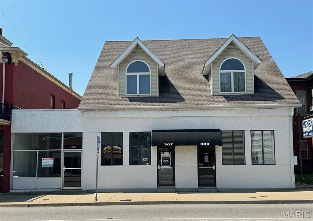 Cash Flowing multi-use property in a prime location in Belleville!  Just blocks from the Belleville Square you will find 3 commercial units with 2 residential units above all facing N Illinois!  You will find an additional business in the spacious garage area at the rear of the property!  That's 6 total units generating income!  All currently occupied!  Both upper level 1-bedroom / 1-bath units are updated!  Off-street parking in rear!  3 additional parcels of land included!  Contact your favorite agent to set up a showing today!