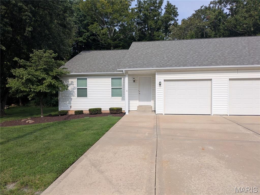 Welcome home to this wonderful 3-bedroom, 2-bathroom duplex unit available for lease in Columbia, IL! With its comfortable and functional layout, this well-appointed property offers everything you need for comfortable everyday living in a fantastic location.

The main level features a bright and welcoming kitchen, a dedicated dining room perfect for meals and gatherings, two comfortable bedrooms, and a full bathroom. Patio doors lead out to the private patio and backyard — the perfect spot for relaxing and enjoying the outdoors. A dedicated laundry room and an attached one-car garage add exceptional everyday convenience.

The finished lower level expands your living space significantly, featuring a spacious family room perfect for relaxing and entertaining, a third bedroom, and a second full bathroom providing comfortable and flexible accommodations for a variety of lifestyles.

This wonderful unit is move-in ready and available for viewing today! All appliances included — refrigerator, microwave, dishwasher, oven, washer, and dryer. Lawn care is covered by the owner. Tenant is responsible for all utilities.

Lease Details:
Monthly Rent: $1,500/month
Security Deposit: $1,500
Minimum take-home income of $4,500/month required to qualify
Cats welcome with a $250 non-refundable pet deposit
Please complete the rental application provided in the supplements prior to scheduling a showing.

Agent interest in property. Please refer all inquiries to property manager Timothy Davis at 618-281-8989.