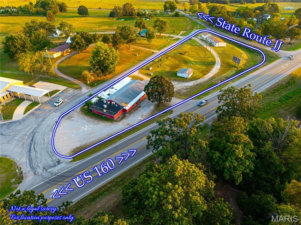 Imagine being the new owner of TJ's Hickory House and bringing it back to life! OR whatever you want it to be. The building is just a shell. In addition, there's a 2,280 sq. ft. 3BD/2BA house on the property, built in 2003, with a 3-car garage, all on 2.5 acres. WHAT A DEAL!  US Highway Frontage! Plus County Road Frontage. Live and work all at the same location! Endless Opportunities.  There is a mobile home hook-up or campsite.  lot. It would make a great auto sales, trailer sales, office space, antique barn, or warehouse,  RV sites, approx. 5 minutes to Walmart.