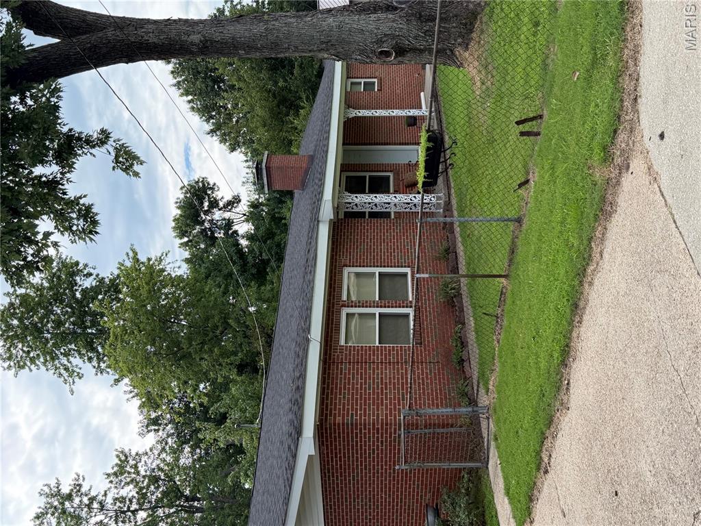 Conveniently located with easy access to I-55 or downtown Sikeston, is this a fabulous home that has been remodeled down to the STUDS! This all Brick Ranch home is deceptively larger than it appears on the outside. Over half an acre, four bedrooms, three baths, with everything being redone and installed in 2024.  Over 1900 finished square feet inside, a covered front porch, Enclosed and Covered Patio off the rear of the home, oversized fenced in yard with mature trees. Everything including the Kitchen cabinets was brand new 2 years ago. Youll find a kitchen island, oversized laundry/mud room, a dining room large enough for your buffet, hutch and dining table, Fireplace, two car garage and plenty of off street parking for your get togethers. This home is extraordinary, with plenty of entertainment space outdoors and even a fenced in front yard for you to let you fur babies out with ease.