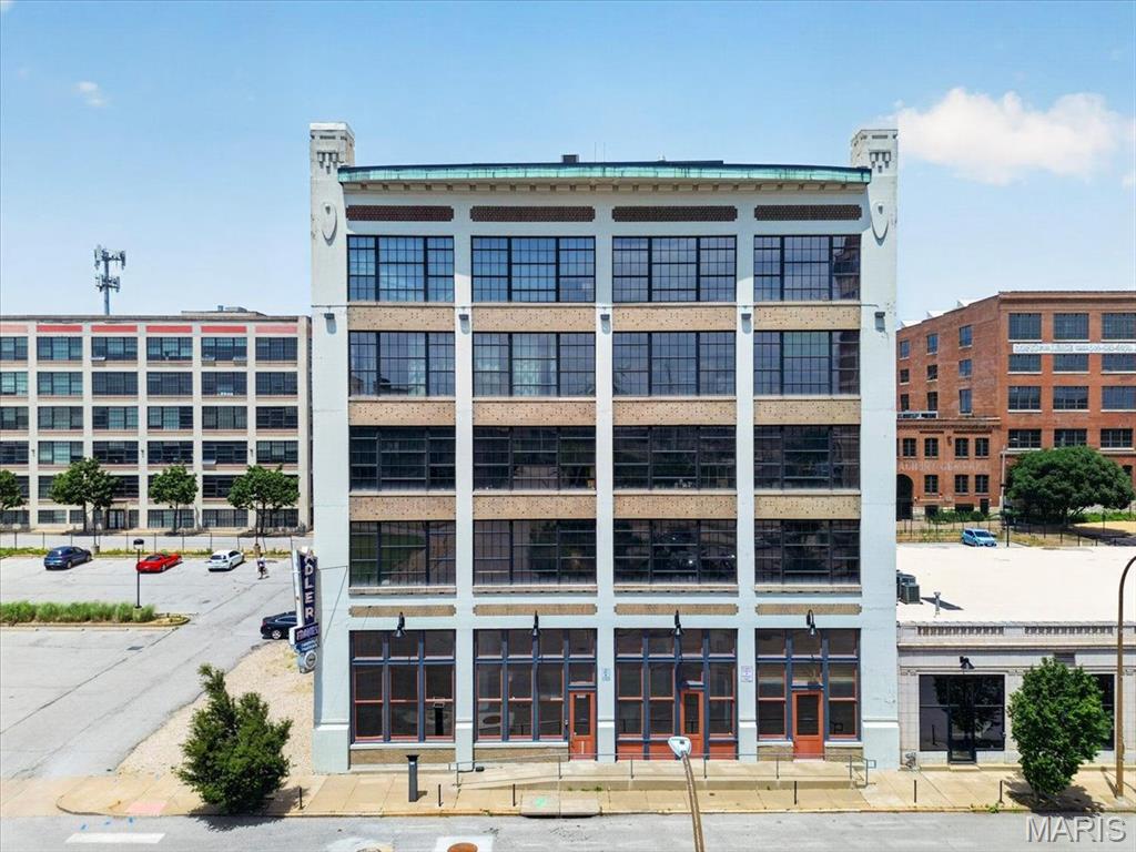 Discover urban living at its best in this stylish 1-bedroom loft at 2035 Washington Ave, Unit 202, located in the sought-after Adler Frame Lofts. This unit features the character and charm loft buyers love, with an open floor plan, high ceilings, and large windows that fill the space with natural light. The layout offers flexibility for both comfortable living and entertaining, while maintaining a modern industrial feel.  The outside deck off the living room offers a gas grill, space of entertaining and eastern view of downtown.
Step outside and enjoy everything Downtown St. Louis has to offer. Just a short walk to Washington Avenue’s vibrant nightlife, popular restaurants, and entertainment venues, plus easy access to CITY PARK soccer stadium and Highway 40 for convenient commuting. Whether you are looking for a primary residence, a city retreat, or an investment opportunity, this loft delivers location, lifestyle, and value.