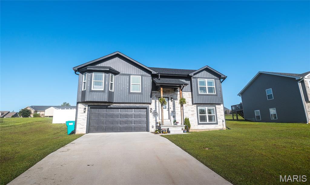 Welcome to modern living at its finest in this stunning 4-bedroom, 3-bathroom home built in 2023. Thoughtfully designed with today's lifestyle in mind, this move-in-ready home offers the perfect combination of contemporary style, functional space, and quality craftsmanship. From the moment you step inside, you'll be greeted by an open-concept floor plan filled with natural light, creating a warm and inviting atmosphere that's perfect for both everyday living and entertaining. At the heart of the home, the beautifully appointed kitchen is sure to impress with sleek granite countertops, stylish cabinetry, stainless steel appliances, and plenty of workspace for preparing meals or gathering with family and friends. Luxury vinyl plank flooring flows seamlessly throughout the main living areas, adding both elegance and durability while tying the home's modern design together. The spacious primary suite offers a peaceful escape at the end of the day, featuring a spa-inspired ensuite bathroom with a large walk-in shower and sophisticated finishes that create a relaxing retreat. Three additional bedrooms provide generous space for family, guests, or the flexibility to create a home office, fitness room, or hobby space to fit your lifestyle. Step outside to enjoy the privacy of the fully fenced backyard with a vinyl privacy fence, offering the perfect setting for children, pets, outdoor entertaining, or simply unwinding after a busy day. If you've been searching for a like-new home that blends modern finishes, thoughtful design, and move-in-ready convenience, this one is a must-see. Schedule your private showing today and experience everything this exceptional home has to offer!
