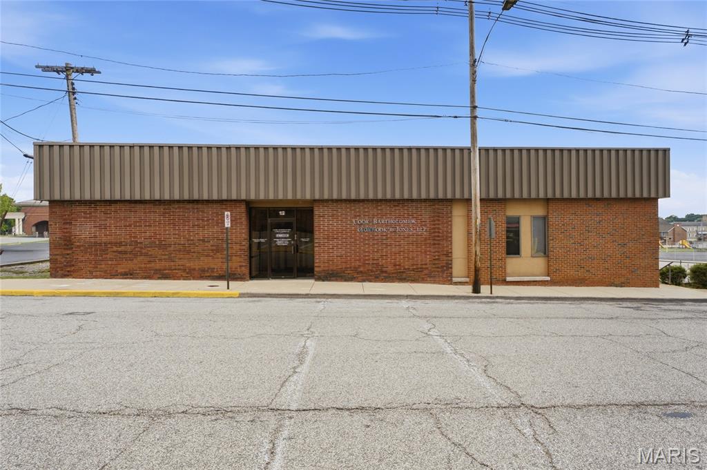 Ideal for a shared office space concept!

Situated just one block from the St. Clair County Courthouse, this 8,500+ square foot building combines functionality and convenience in a prime downtown location. The interior features a layout designed for professional use, offering numerous private offices, spacious meeting rooms, and versatile work areas to accommodate various business needs.  

The property includes its own parking lot with over 15 spaces, a rare amenity in downtown Belleville, ensuring ease of access for employees and clients. Perfectly positioned near the courthouse and downtown amenities, this building is an ideal choice for law firms, corporate offices, or businesses.

Property contains 2 parcels 08-28.0-204-013 & 08-28.0-204-012 Location: City