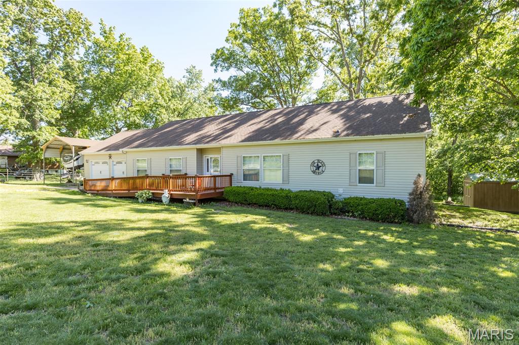 Are you Looking for a Nice Sized Home Located Just Out of Town? Check This 3 Bed, 2 Bath Home Out! Great Sized Living Room, Formal Dining Area & Kitchen with All Appliances, Walk In Pantry and an Island for Gathering Around! Split Bedroom Plan Allows for a Private Master Suite with Huge Walk In Closet! Attached Oversized 2 Car Garage gives Plenty of Room for your Cars +Storage! Outside has a 2 Car Carport big enough to store your Camper! Backyard is Private with a Nice Covered Back Porch Area! Check This Out Today- Ironton Address and Bismarck Schools!