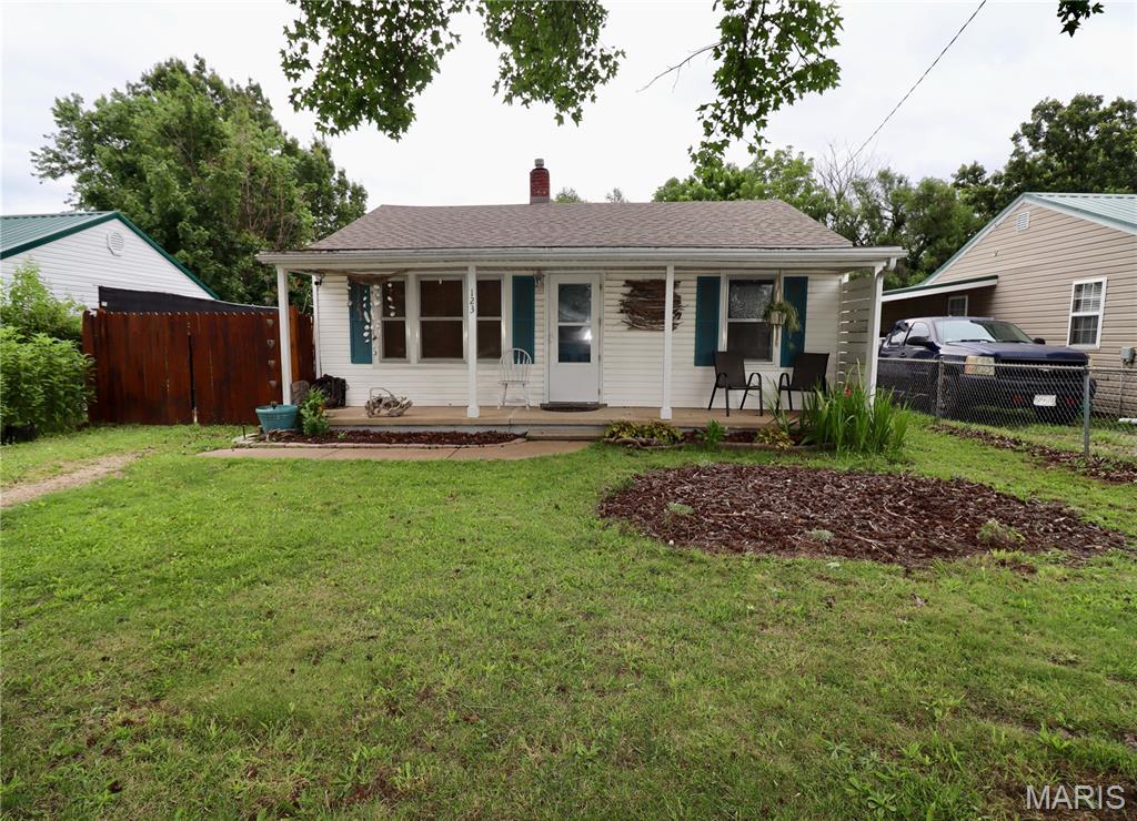 Welcome to 123 Cedar Crest Drive! This charming 2-bedroom, 1-bath home offers 864 square feet of comfortable living space in a quiet neighborhood close to shopping, dining, and everyday amenities. Inside, you'll find a spacious utility room with additional space currently used as a hobby area, providing flexibility for crafts, storage, or a home workspace. Step outside to enjoy the generously sized backyard featuring a large garden that will soon be producing fresh fruits and vegetables. Whether you're looking for your first home, downsizing, or seeking an investment opportunity, this property offers comfort, convenience, and a backyard ready for gardening, entertaining, or simply relaxing.